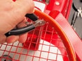 Cutting the excess of string of a Tennis racquet