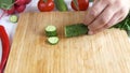 Cutting fresh cucumber