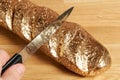 Cutting golden bread