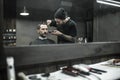 Cutting hair in barbershop