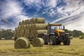 Cutting hay the tractor Royalty Free Stock Photo