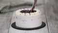 Cutting a Homemade Vertical Layer Blackcurrant Cake.