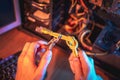Cutting the Internet cable tied into a knot with wire cutters. Disconnecting the Internet and restricting access Royalty Free Stock Photo