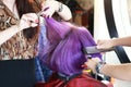 Cutting and ironing on violet hair