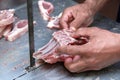 Cutting lamb rack or chop Royalty Free Stock Photo