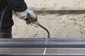 Cutting lengthy metal rolling gas torch