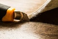 Cutting of linoleum and floor coverings Royalty Free Stock Photo