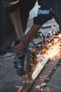 Cutting metal with grinding machine, spark Royalty Free Stock Photo