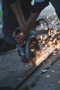 Cutting metal with grinding machine, spark Royalty Free Stock Photo