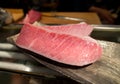 Cutting of otoro from blue fin tuna for sashimi. Royalty Free Stock Photo