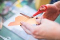 cutting paper with scissors for collage art Royalty Free Stock Photo