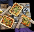 Cutting pizza. Domestic food and homemade pizza. Royalty Free Stock Photo