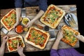 Cutting pizza. Domestic food and homemade pizza. Royalty Free Stock Photo