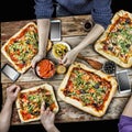 Cutting pizza. Domestic food and homemade pizza. Royalty Free Stock Photo