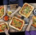 Cutting pizza. Domestic food and homemade pizza. Royalty Free Stock Photo