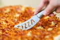 Cutting Pizza Royalty Free Stock Photo