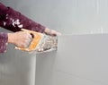 Cutting plasterboard plaster hand dirty saw Royalty Free Stock Photo