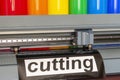 Cutting plotter close-up. The process of cutting a vinyl film