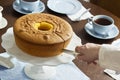 Cutting the PÃÂ£o de Lo, or Portuguese Sponge Cake