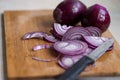 Cutting red onions Royalty Free Stock Photo