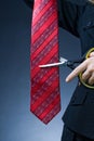 Cutting red tie Royalty Free Stock Photo