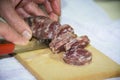 Cutting salami Royalty Free Stock Photo