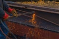 Cutting scrap metal by thermal lance closeup Royalty Free Stock Photo