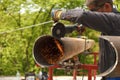 Man cuts flex steel products Royalty Free Stock Photo