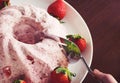 Cutting a Strawberry Charlotte or Mousse Cake