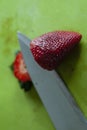 Cutting Strawberry with knife process 2 of 6