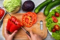 Cutting sweet pepper for a vegetable salad