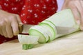 Cutting vegetable marrow Royalty Free Stock Photo