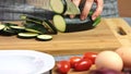 Cutting vegetables for a guacamole with vegies recipe