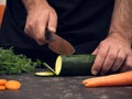 Cutting vegetables on a stone table for meal preparation Royalty Free Stock Photo