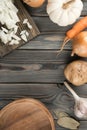 Cutting white spicy onion into cubes on kitchen wooden board. Empty bowl for diced onion. Flat lay view. Healthy food.