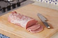 Cutting whole raw pork loin Royalty Free Stock Photo
