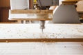 Cutting wood using a machine with numerical control. Cnc tool. Royalty Free Stock Photo