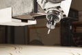 Cutting wood using a machine with numerical control. Cnc tool. Royalty Free Stock Photo