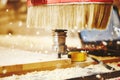 Cutting wood using a machine with numerical control. Cnc tool. Royalty Free Stock Photo
