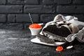Cuttlefish ink bread and red caviar on black background Royalty Free Stock Photo