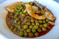 Cuttlefish with peas Royalty Free Stock Photo