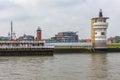 German harbor Cuxhaven with lighthouse and radar tower shipping navigation