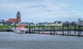 Cuxhaven, Germany - 02.25.2022: Panorama of the city with green flood barrier in the port of Cuxhaven on very early