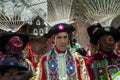 Portrait of a man wearing traditional clothes during the Huaylia on Christmas day in front of the Cuzco Cathedral