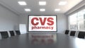 CVS Health logo on the screen in a meeting room. Editorial 3D rendering