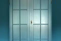 Cyan blue wall with cupboard stylish interior,modern blue cupboard door background texture beautiful luxury house Royalty Free Stock Photo