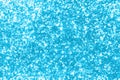 cyan light Glitter background ideal as backdrop of page or panel with lights Royalty Free Stock Photo