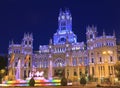 Cybele Palace and fountain illuminated at night in Madrid, Spain Royalty Free Stock Photo