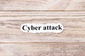 Cyber attack of the word on paper. concept. Words of Cyber attack on a wooden background Royalty Free Stock Photo