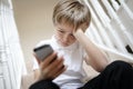 Cyber bullying by phone text message Royalty Free Stock Photo